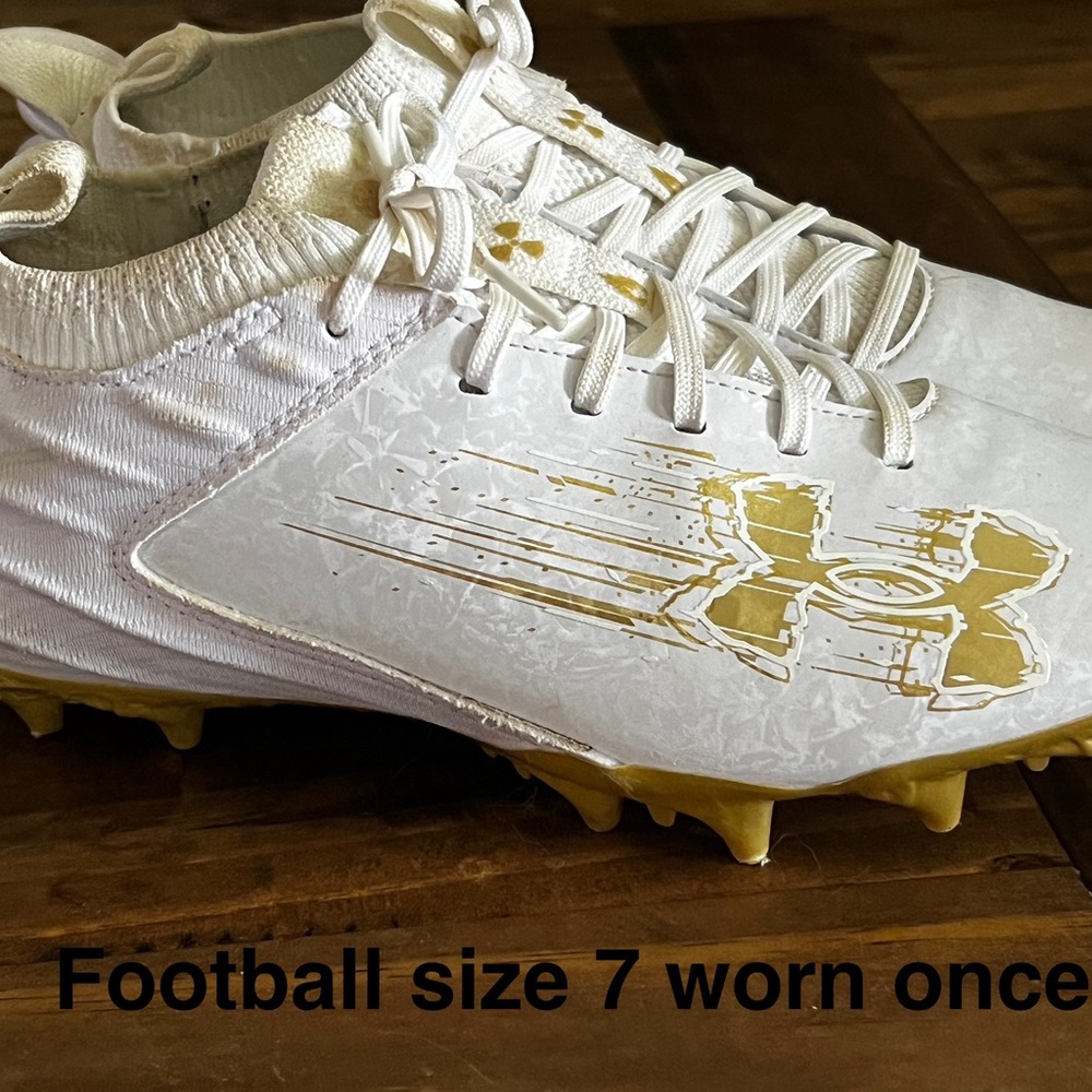 Under Armour White and Gold Athletic Cleats